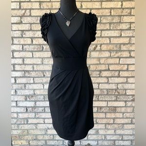 vfish Brand/Design. Size S in black with ruffles on the shoulders.